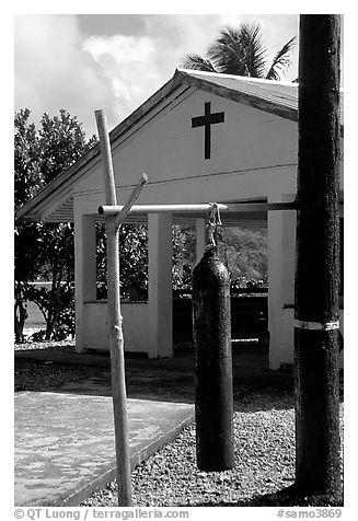 Gong and church, Aunuu village. Aunuu Island, American Samoa