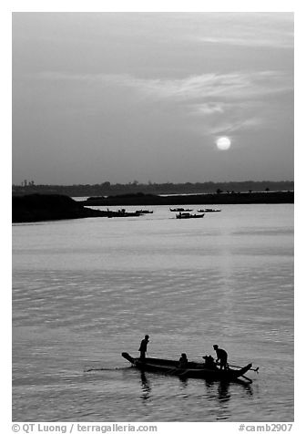 Boat and sunrise, Tonle Sap,  Phnom Phen. Cambodia (black and white)