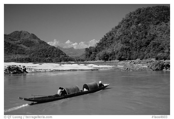 Narrow live-in boat. Mekong river, Laos (black and white)