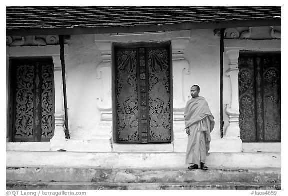 Novice Buddhist monk at Wat Pakkhan. Luang Prabang, Laos (black and white)