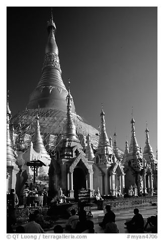 Praying at Planetery post, the Shwedagon Paya. Yangon, Myanmar (black and white)