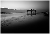 The gate of the lake, sunrise. Inle Lake, Myanmar (black and white)