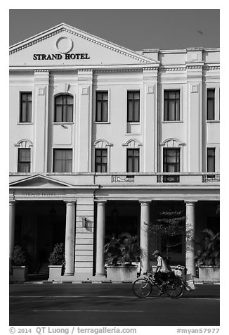 Rickshaw and Strand Hotel. Yangon, Myanmar (black and white)