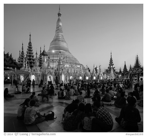 Praying from the Victory Ground, Shwedagon Pagoda, sunset. Yangon, Myanmar (black and white)