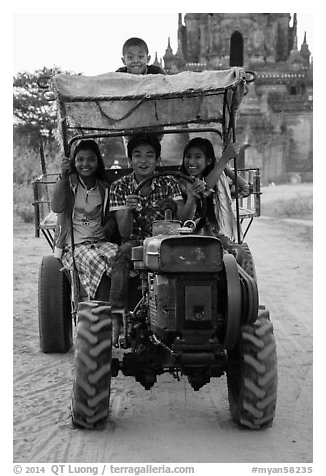 Children driving tractor, Minnanthu village. Bagan, Myanmar (black and white)