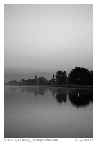 Pastel colors of dawn on Mandalay Fort moat. Mandalay, Myanmar (black and white)