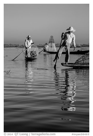 Intha fishermen and reflections. Inle Lake, Myanmar (black and white)
