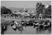 Villagers arriving by boat at market. Inle Lake, Myanmar ( black and white)