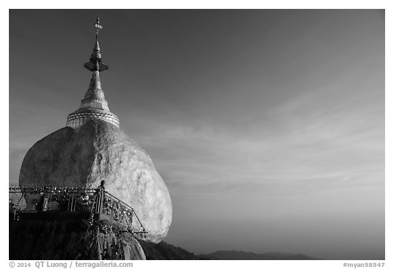 Golden Rock and monk, late afternoon. Kyaiktiyo, Myanmar (black and white)