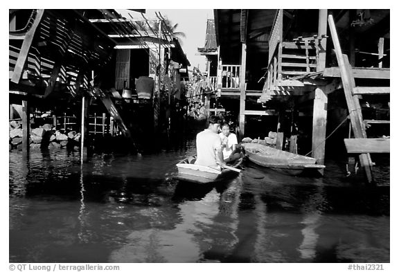 Houses along khlong on Thonbury canals. Bangkok, Thailand (black and white)