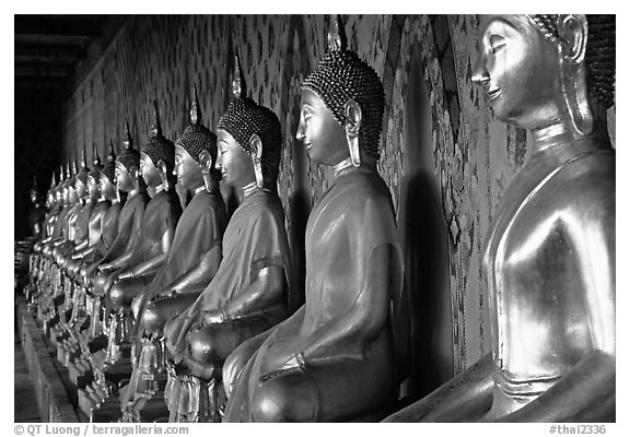 Row of Buddha figures, Wat Arun. Bangkok, Thailand
