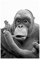 Monkey on monkey statue. Lopburi, Thailand ( black and white)