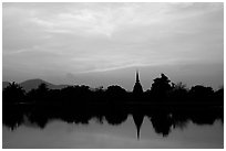 Elegant lines of Wat Si Chum at sunset. Sukothai, Thailand (black and white)