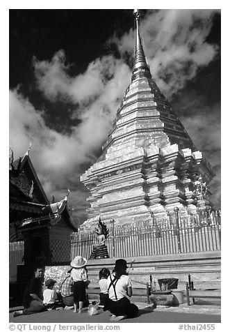 Worshipers at the Chedi of Wat Phra That Doi Suthep. Chiang Mai, Thailand (black and white)