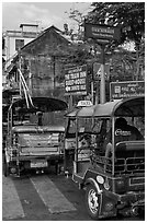 Tuk Tuks and signs. Bangkok, Thailand (black and white)