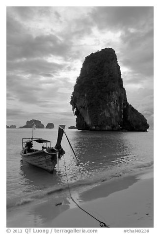 Boat and limestone islets, Rai Leh. Krabi Province, Thailand (black and white)