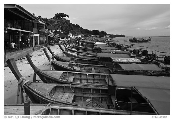 Boats and waterfront houses at dusk Ao Ton Sai, Ko Phi-Phi Don. Krabi Province, Thailand