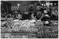 Restaurant with seefood on skewers, Phi-Phi island. Krabi Province, Thailand (black and white)