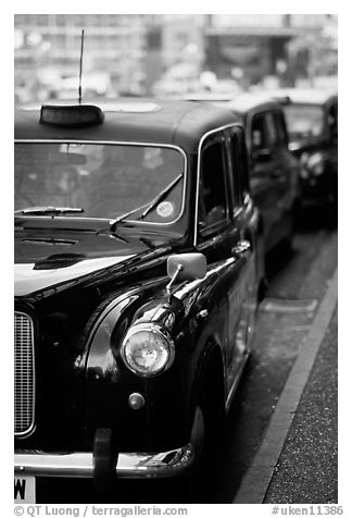 Black London taxis. London, England, United Kingdom (black and white)