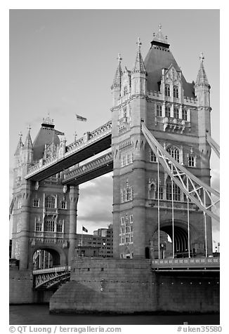 Close view of the two towers of the Tower Bridge. London, England, United Kingdom (black and white)
