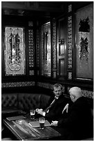 Business men talking over a beer, Victorian boozer Princess Louise. London, England, United Kingdom (black and white)