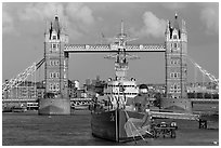 HMS Belfast cruiser and Tower Bridge, late afternoon. London, England, United Kingdom ( black and white)
