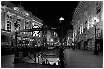 Underground station entrance at dusk, Piccadilly Circus. London, England, United Kingdom ( black and white)