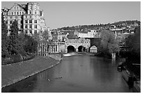 Avon River, Empire hotel, and Pulteney Bridge, morning. Bath, Somerset, England, United Kingdom (black and white)