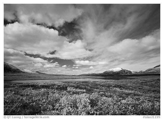 Clouds, tundra, and lake along Denali Highway in autumn. Alaska, USA (black and white)