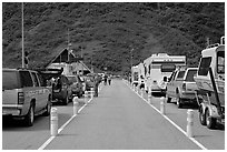 Cars and RVs lining up for the tunnel crossing. Whittier, Alaska, USA ( black and white)