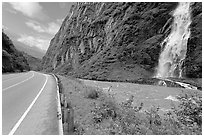Bridalveil Falls cascading next to rood, Keystone Canyon. Alaska, USA ( black and white)