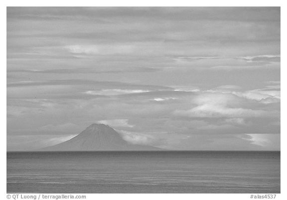 Mt Augustine, a volcano seen across the Cook Inlet. Ninilchik, Alaska, USA (black and white)