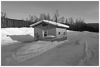 Drive-in coffee shop in isolated winter landscape. Alaska, USA ( black and white)