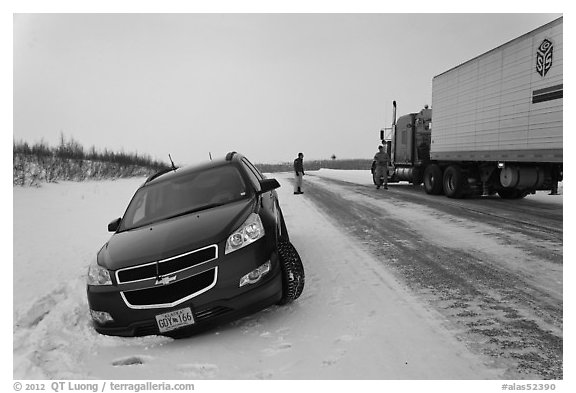 Car stuck in snow along Dalton Highway. Alaska, USA