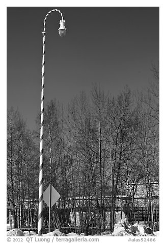 Street light decorated with a candy cane motif. North Pole, Alaska, USA (black and white)