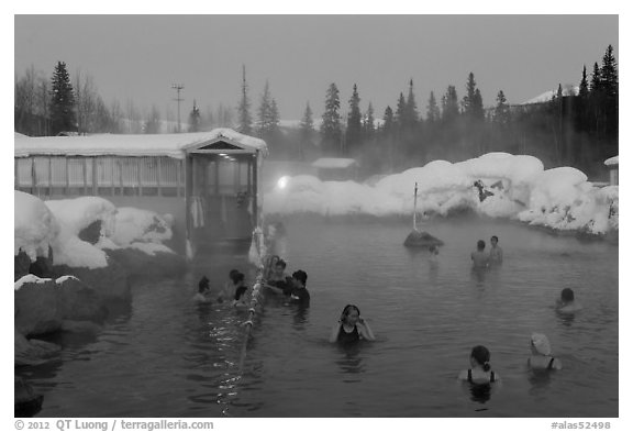 Popular outdoor hot springs, winter twilight. Chena Hot Springs, Alaska, USA (black and white)