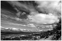 Valley and large white clouds. Alaska, USA (black and white)