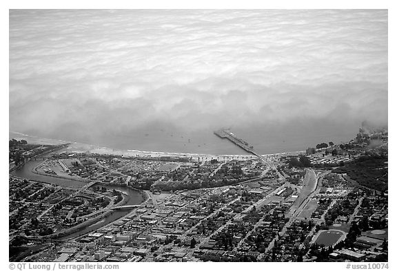 Aerial view of Santa Cruz with fog-covered ocean. Santa Cruz, California, USA (black and white)