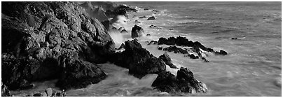 Rocky seashore, Garapata. Big Sur, California, USA (Panoramic black and white)