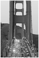 Traffic on Golden Gate Bridge at sunset. San Francisco, California, USA (black and white)