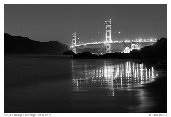 Golden Gate bridge at night from Baker Beach. San Francisco, California, USA (black and white)