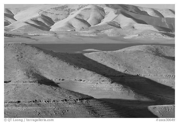Hills in summer and San Luis Reservoir. California, USA (black and white)