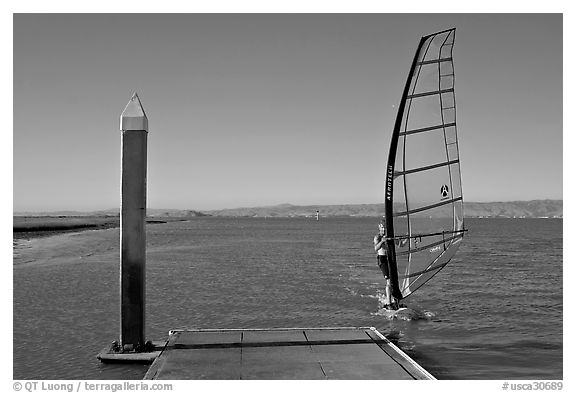 Windsurfer near deck, Palo Alto Baylands. Palo Alto,  California, USA (black and white)