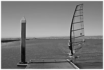 Windsurfer near deck, Palo Alto Baylands. Palo Alto,  California, USA (black and white)