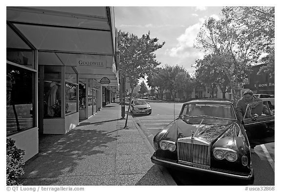 Goodwill store and Rolls-Royce on  Santa Cruz avenue. Menlo Park,  California, USA (black and white)