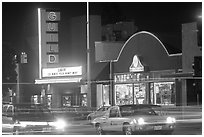 El Camino Real at night, with movie theater and Menlo Clock Works. Menlo Park,  California, USA (black and white)