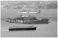 Cargo ships and Alcatraz Island in the San Francisco Bay. San Francisco, California, USA ( black and white)