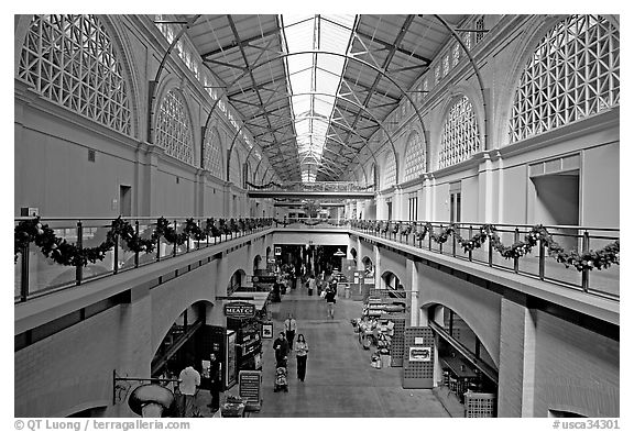 Central nave  of the renovated Ferry building. San Francisco, California, USA (black and white)