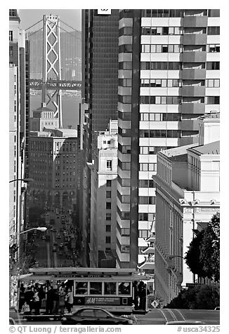 Cable-car, Chinatown, Financial District and Bay Bridge. San Francisco, California, USA