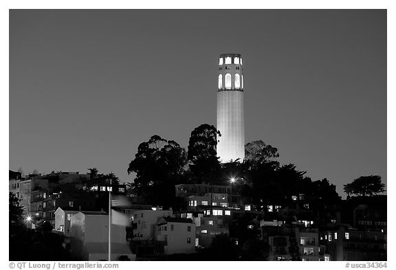 Coit Tower and Telegraph Hill at night. San Francisco, California, USA (black and white)
